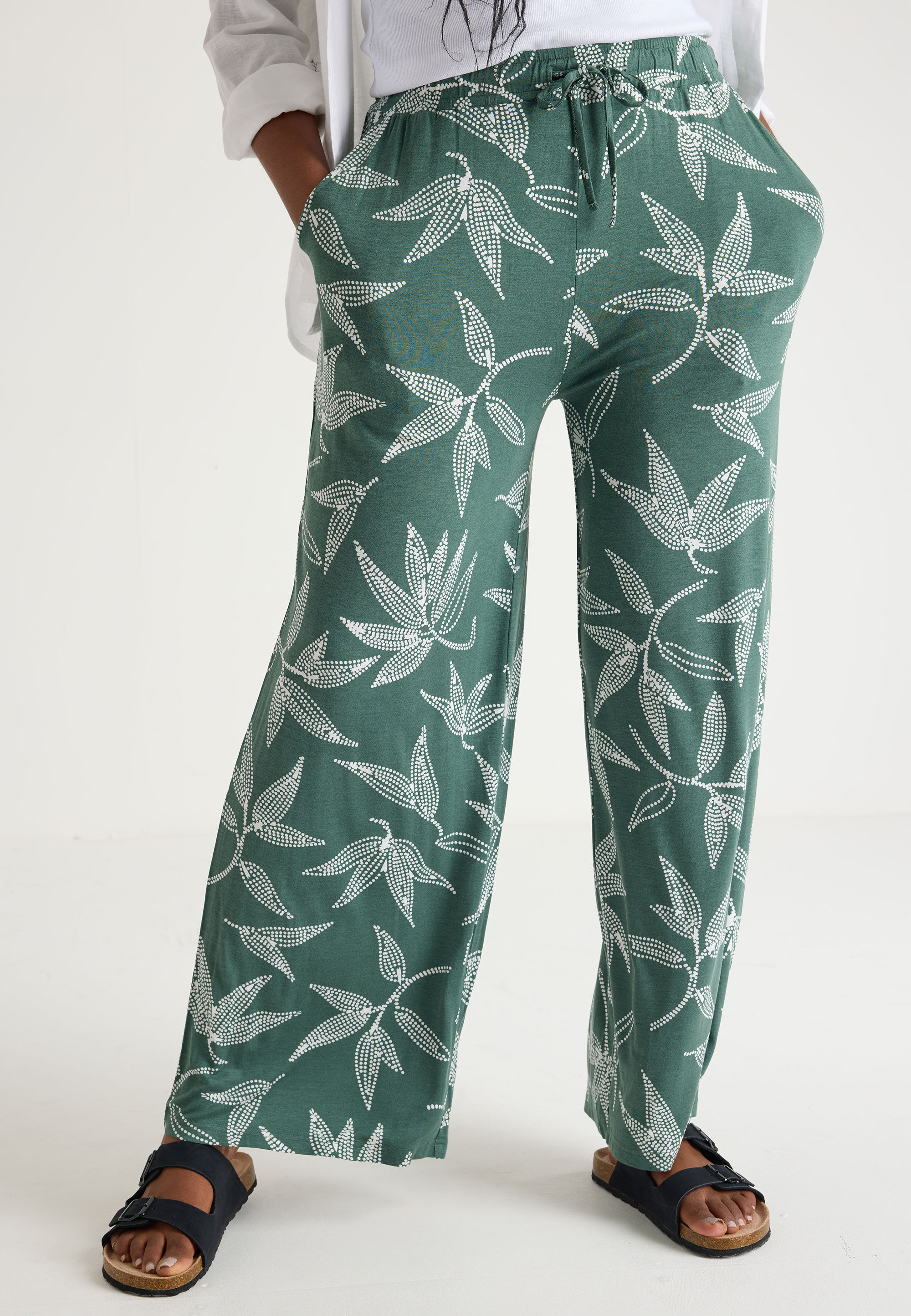 Wide leg trousers peacocks top
