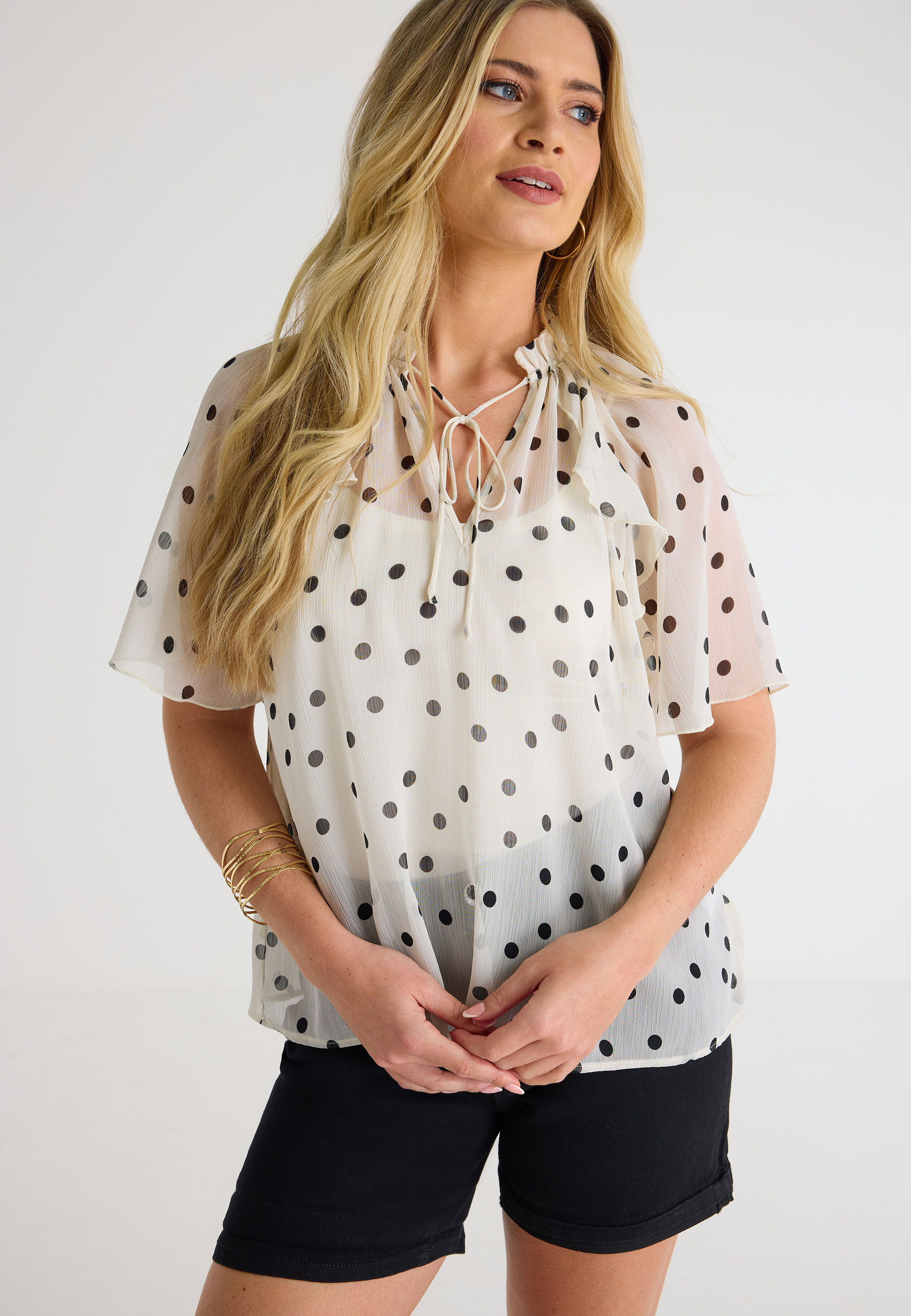 White blouse with black spots discount
